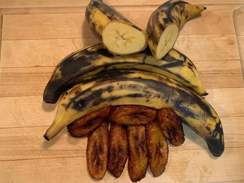 A bunch of bananas that are on the ground